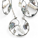 Raw quartz nugget and silver blue fresh water pearl variety embellished an oxidized sterling silver hoop necklace on a dainty chain necklace