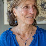 Faceted lapis triangles hang from oxidized and gold dot chain hanging from brass mini diamonds lined with pyrite earrings