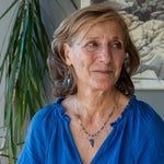 Handmade brass oval links suspended between pyrite gemstones links and lapis gemstones with a lapis point on gold filled oval chain layered necklace