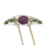 Pink tourmaline hexagon slice surrounded by green kyanite gemstones inside a hammered sterling silver boat shaped pendant, wrapped in gold fill wire with gold filled delicate chain necklace