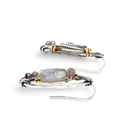 oxidized sterling silver hoops with stamped bronze and oxidized sterling twist swishes holding an iolite faceted tile and fluorite gemstones with built in earring hooks that wear like a post earrings