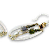 Sterling silver mini oval earrings on a hammered brass strap filled with iolite, silver fresh water pearls, crystal, and black opal gemstones on 14k gold filled wire