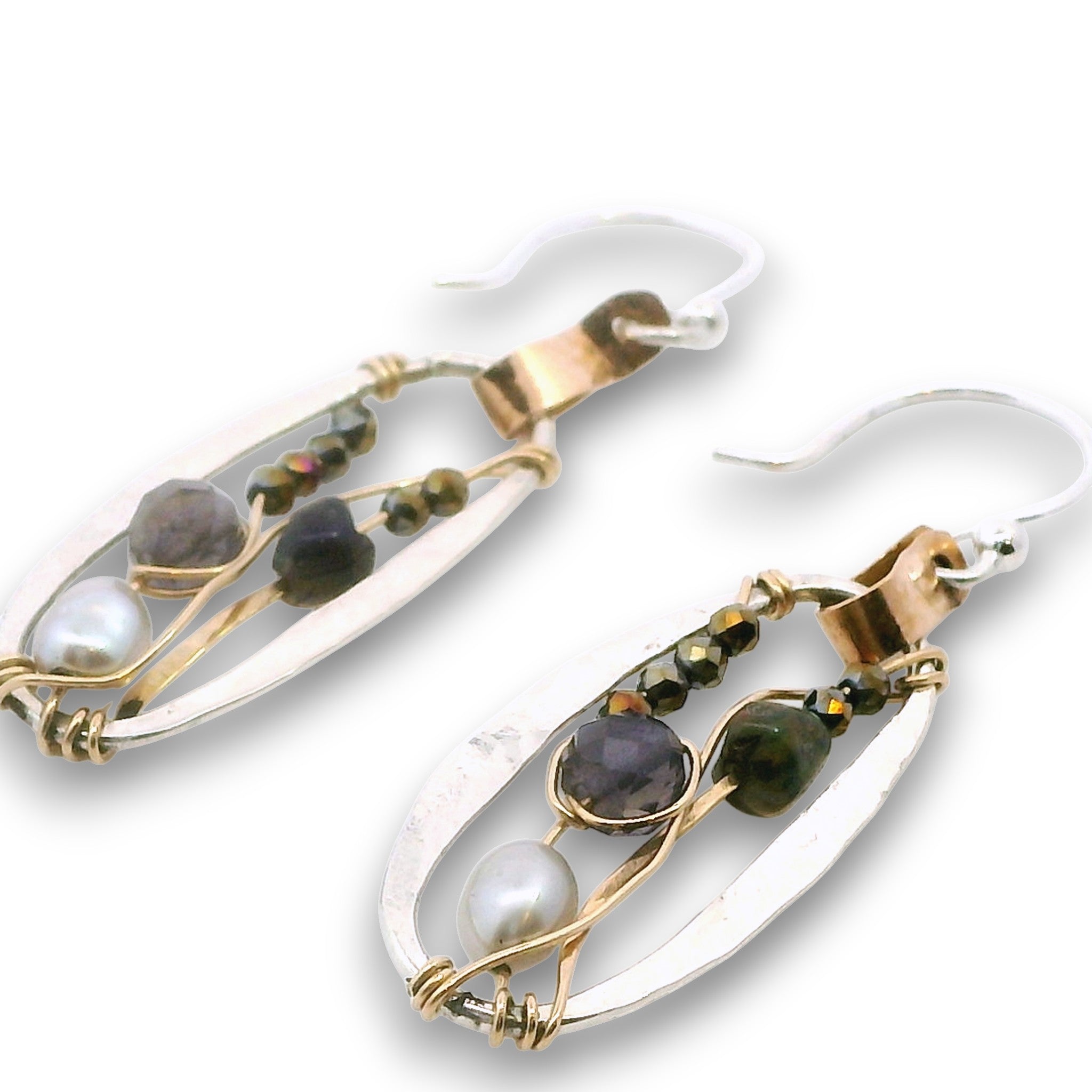 Sterling silver mini oval earrings on a hammered brass strap filled with iolite, silver fresh water pearls, crystal, and black opal gemstones on 14k gold filled wire