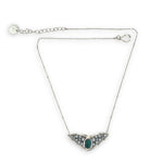 Necklace with sterling silver wings shaped pendant featuring a chrysocolla gemstone and smooth pyrite gemstones 