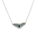 Necklace with sterling silver wings shaped pendant featuring a chrysocolla gemstone and smooth pyrite gemstones 