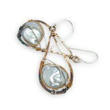 teardrop shaped bronze mini earrings darkened at the bottom with fresh water pearl coins set in brass twist and sterling silver wires
