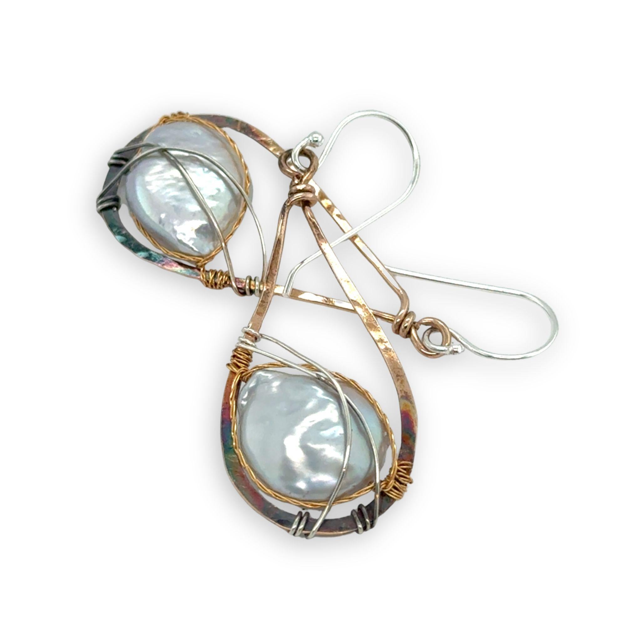 teardrop shaped bronze mini earrings darkened at the bottom with fresh water pearl coins set in brass twist and sterling silver wires