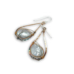 teardrop shaped bronze mini earrings darkened at the bottom with fresh water pearl coins set in brass twist and sterling silver wires