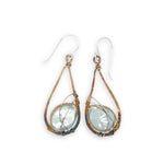 teardrop shaped bronze mini earrings darkened at the bottom with fresh water pearl coins set in brass twist and sterling silver wires