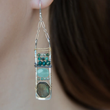 Flashy labradorite, jade, moss agate, and chrysocolla gemstones stacked within and oxidized sterling silver skinny ladder earring frame on gold filled wire