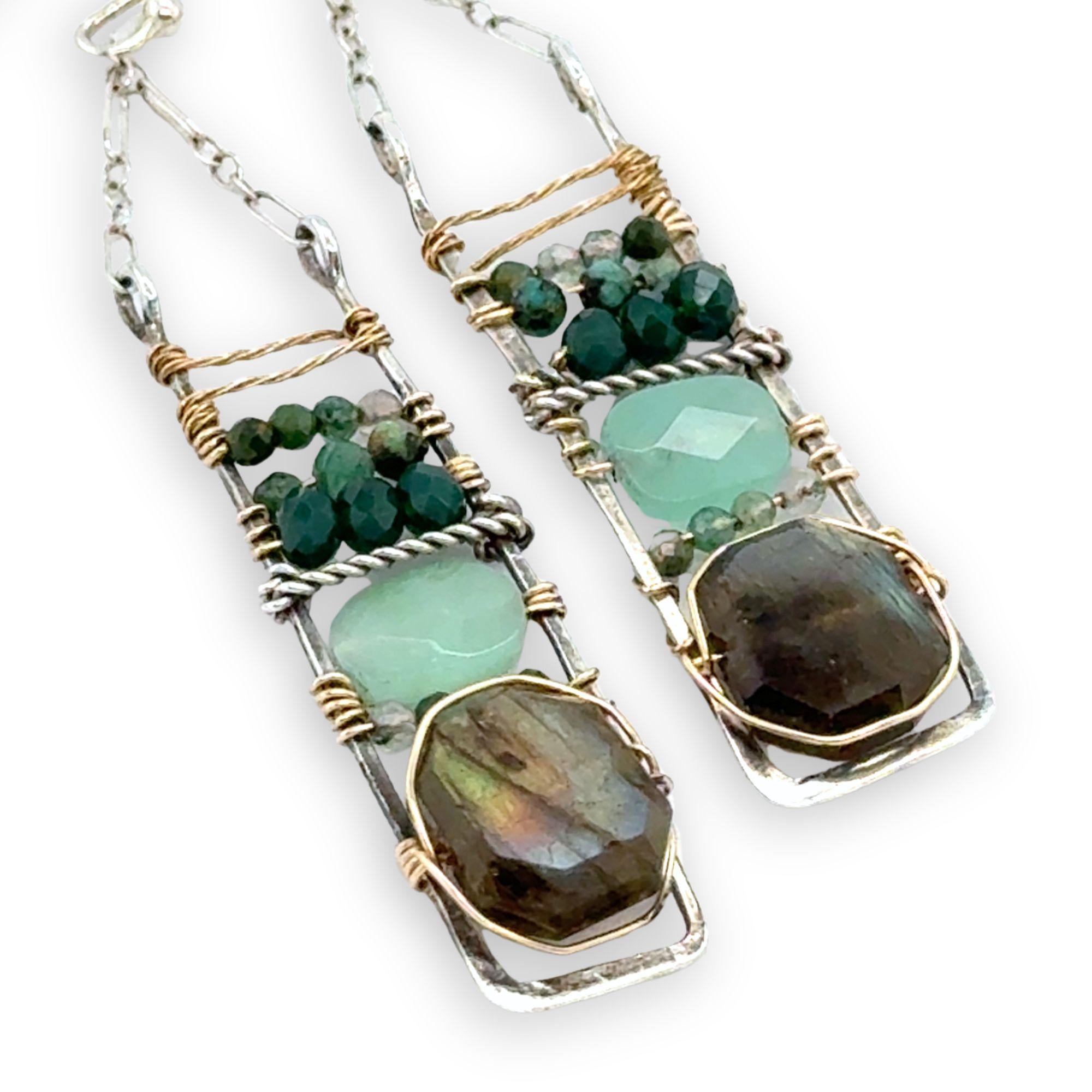 Flashy labradorite, jade, moss agate, and chrysocolla gemstones stacked within and oxidized sterling silver skinny ladder earring frame on gold filled wire
