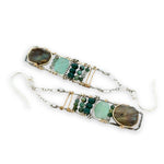 Flashy labradorite, jade, moss agate, and chrysocolla gemstones stacked within and oxidized sterling silver skinny ladder earring frame on gold filled wire