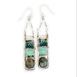 Flashy labradorite, jade, moss agate, and chrysocolla gemstones stacked within and oxidized sterling silver skinny ladder earring frame on gold filled wire