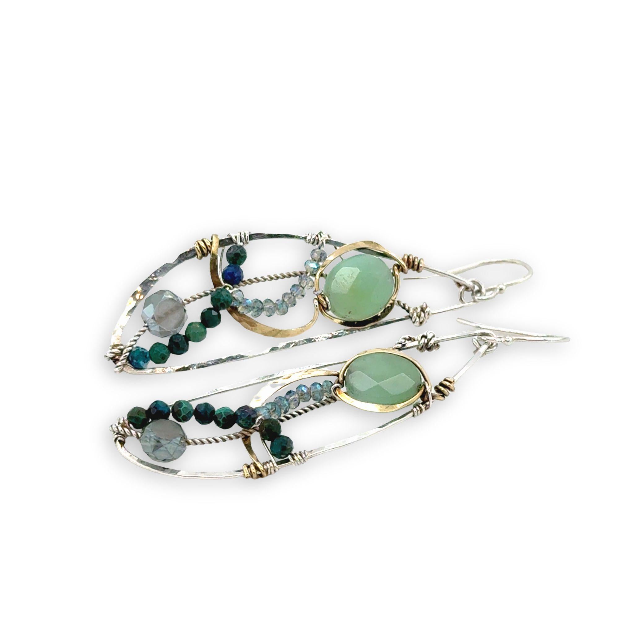 Handmade hammered sterling silver wings embellished with jade, chrysocolla, crystal, brass, and oxidized sterling silver twist wires