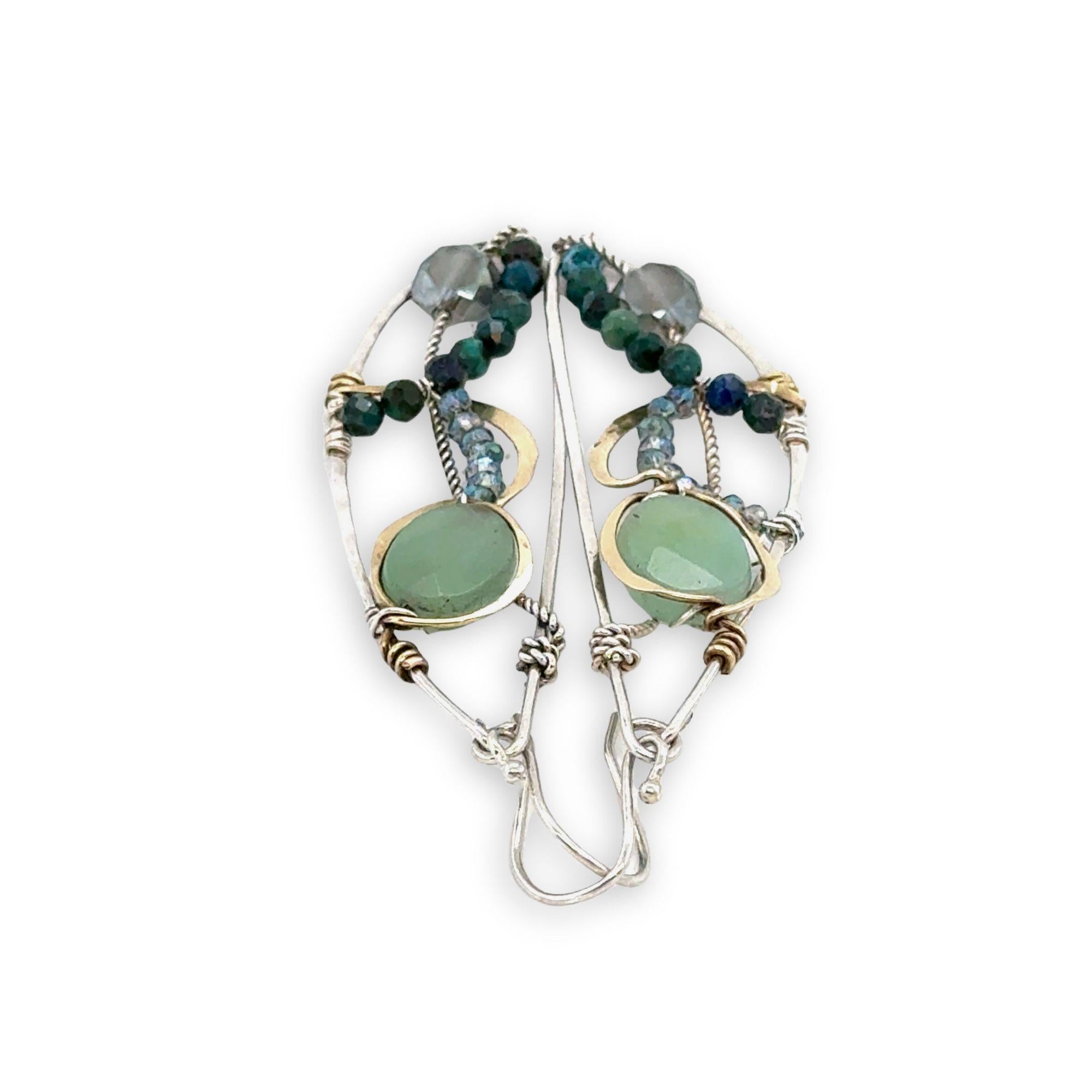 Handmade hammered sterling silver wings embellished with jade, chrysocolla, crystal, brass, and oxidized sterling silver twist wires