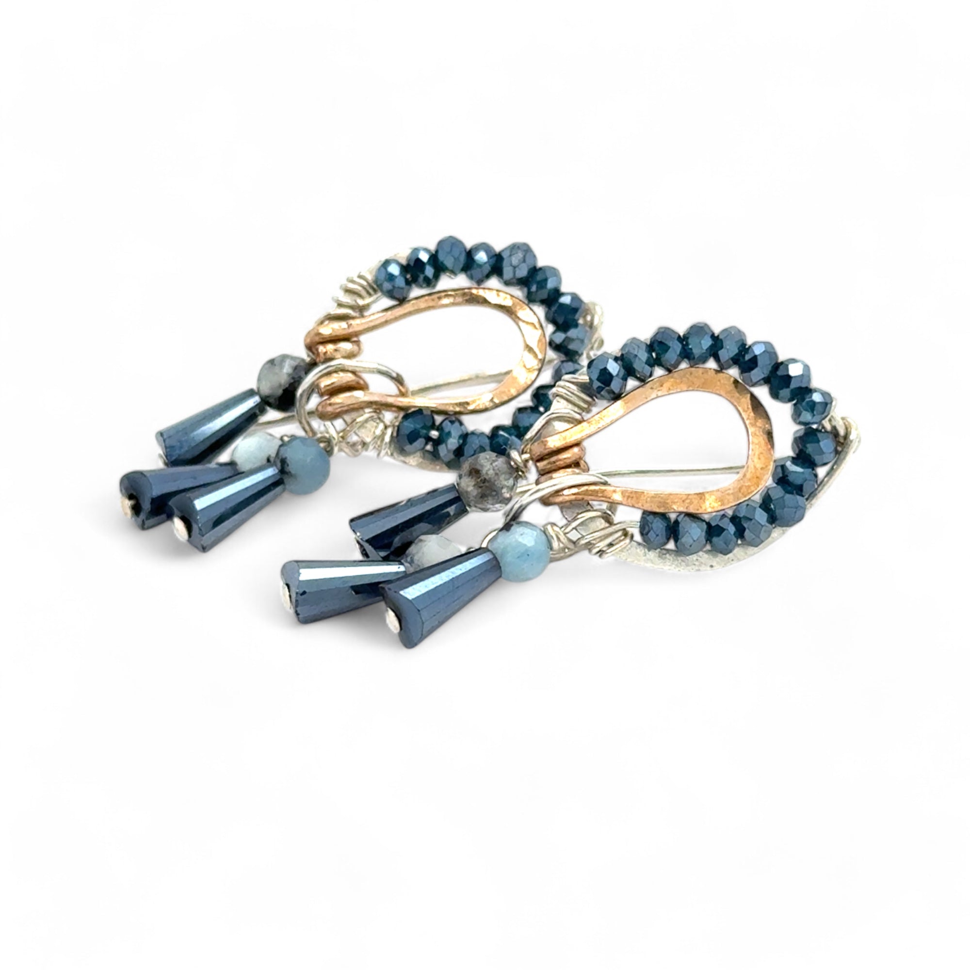 Sterling silver mini earrings with built in earring hooks that wear like a post earrings, with bronze hammered accents, featuring. ink blue crystal and aquamarine gemstones