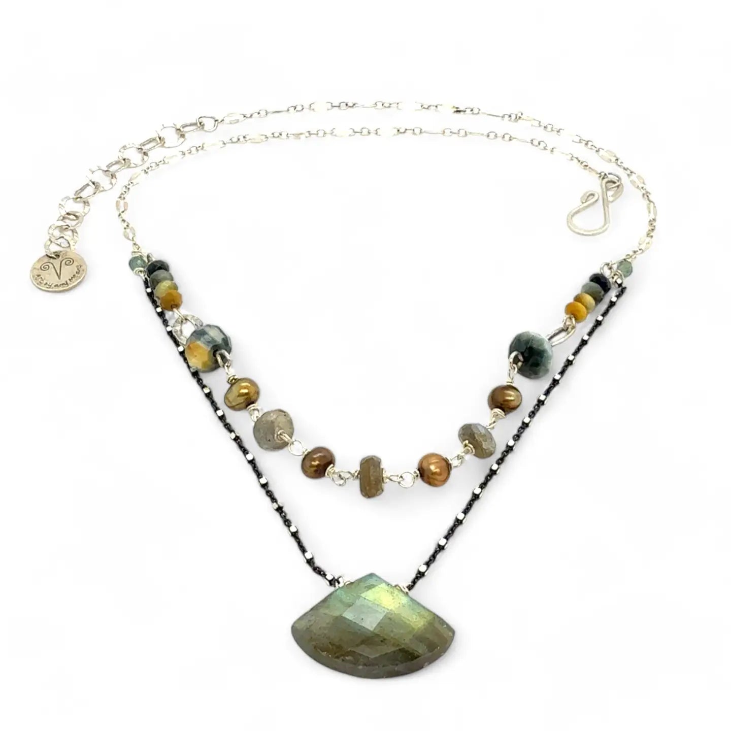 a flashy labradorite an gemstone is held on oxidized sterling silver dot chain with a second layer of cat's eye gemstones and fresh water pearl necklace