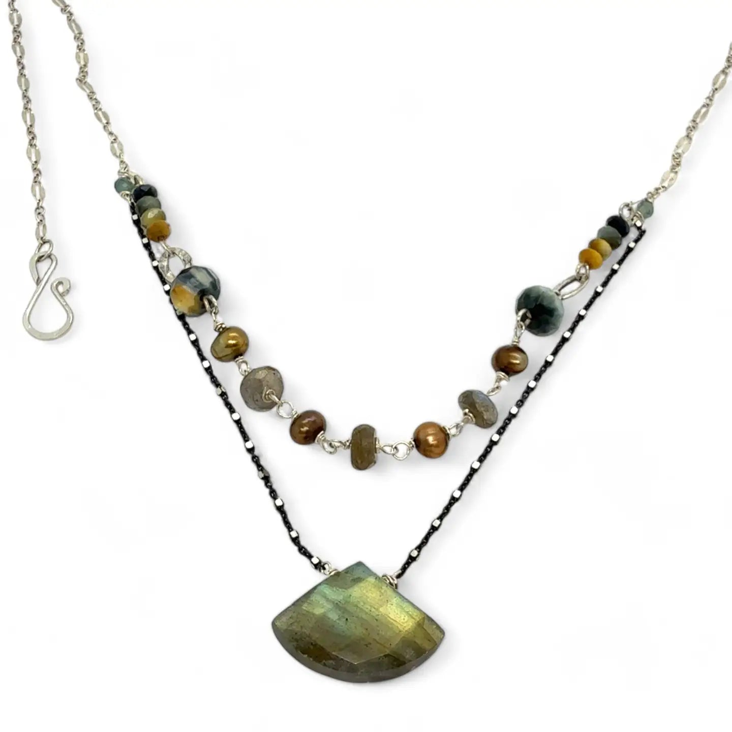 a flashy labradorite an gemstone is held on oxidized sterling silver dot chain with a second layer of cat's eye gemstones and fresh water pearl necklace