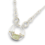 Sterling silver channel hoop pendant with green kyanite, sterling silver beds, and prehnite gemstones, featuring a textured sterling chain and delicate chain necklace