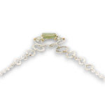 Sterling silver channel hoop pendant with green kyanite, sterling silver beds, and prehnite gemstones, featuring a textured sterling chain and delicate chain necklace