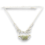 Sterling silver channel hoop pendant with green kyanite, sterling silver beds, and prehnite gemstones, featuring a textured sterling chain and delicate chain necklace