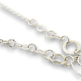 Sterling silver channel hoop pendant with green kyanite, sterling silver beds, and prehnite gemstones, featuring a textured sterling chain and delicate chain necklace