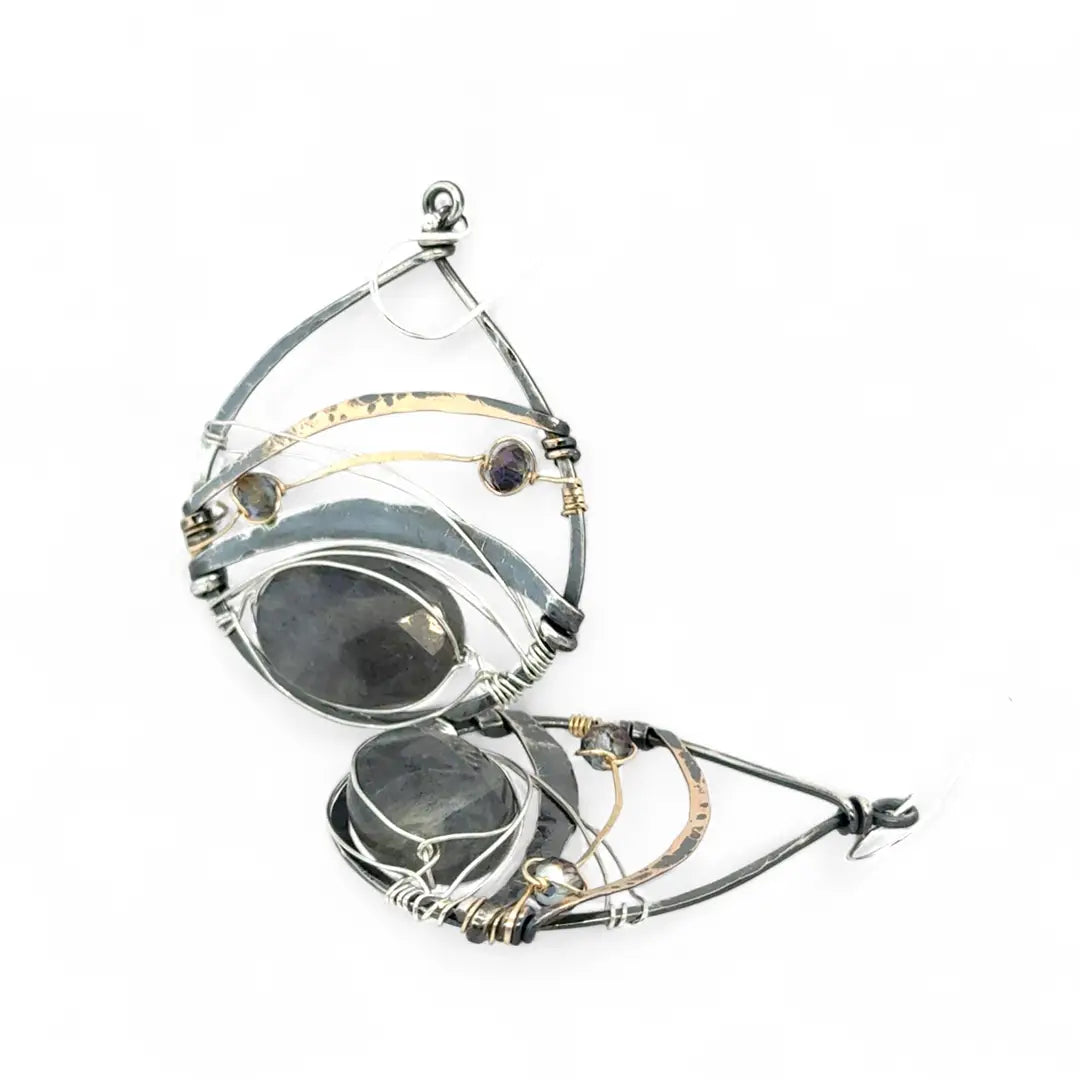 darkened sterling silver fat drop earrings with brass, gold fill and blue crystal accents featuring a prominent flashy labradorite gemstone