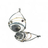 darkened sterling silver fat drop earrings with brass, gold fill and blue crystal accents featuring a prominent flashy labradorite gemstone