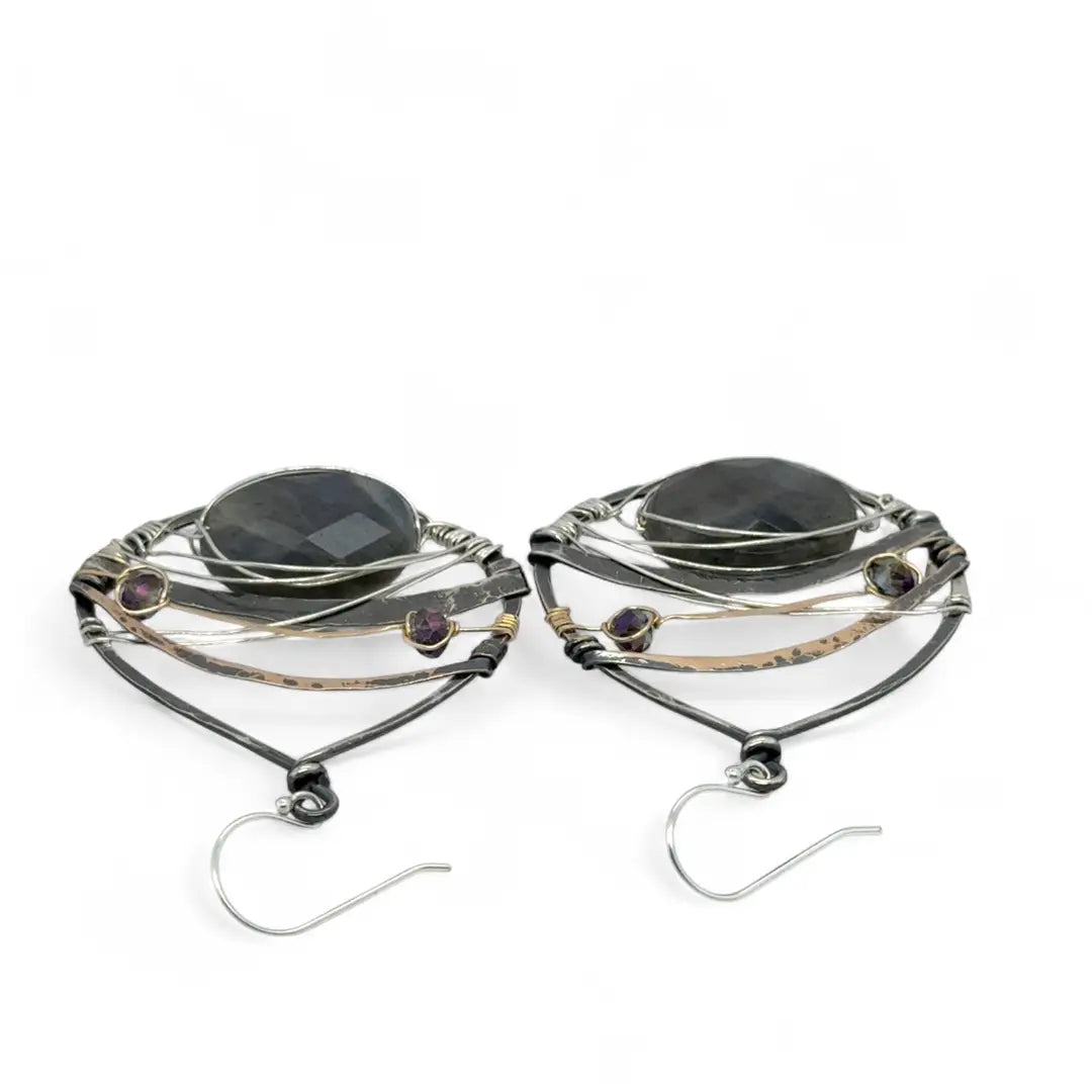 darkened sterling silver fat drop earrings with brass, gold fill and blue crystal accents featuring a prominent flashy labradorite gemstone