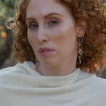 Long skinny sterling silver darkened marquise earrings embroidered with mother of pearl, fresh water pearl, and crystal gemstones on sterling silver and gold filled wire