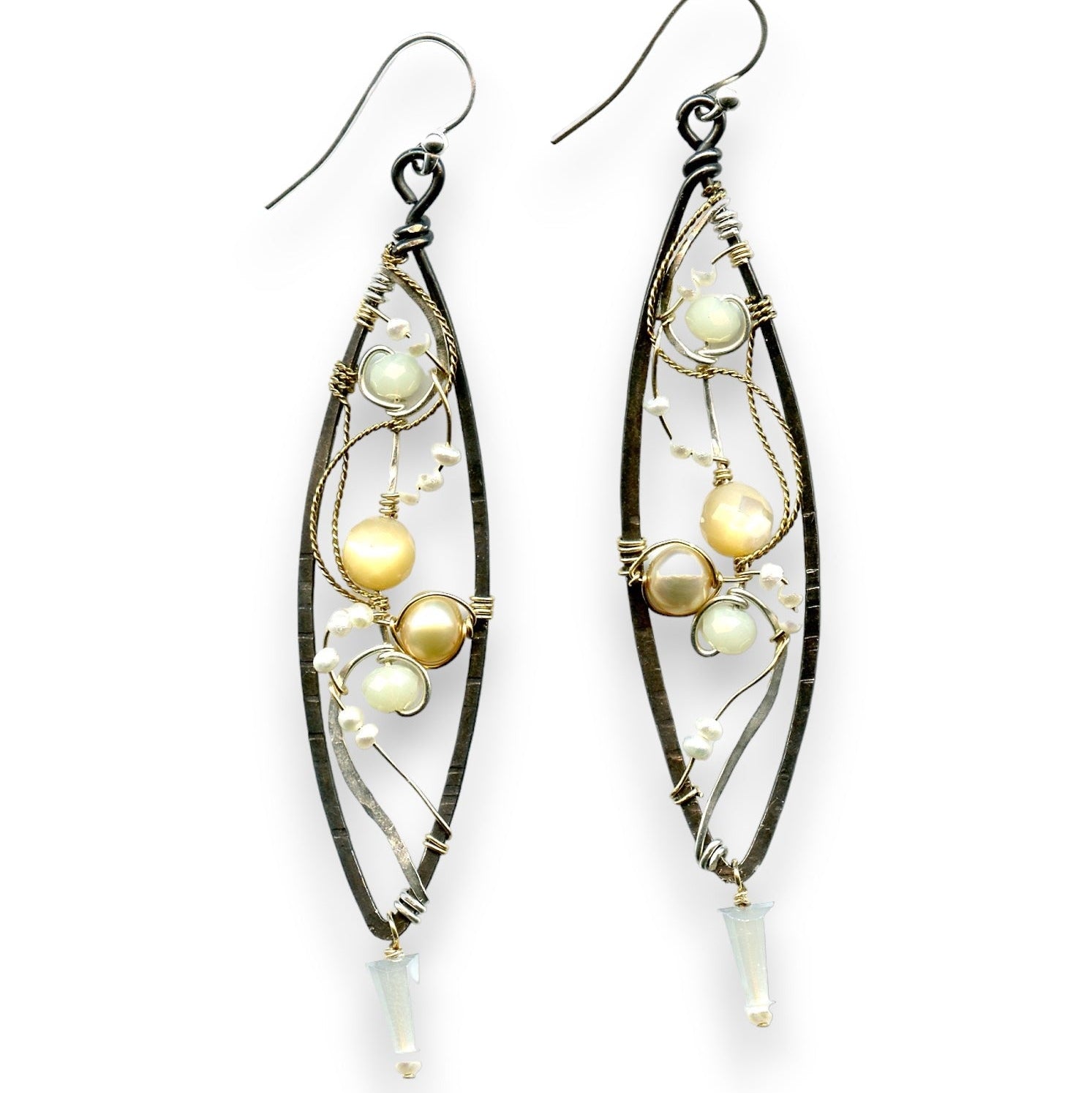Long skinny sterling silver darkened marquise earrings embroidered with mother of pearl, fresh water pearl, and crystal gemstones on sterling silver and gold filled wire