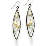Long skinny sterling silver darkened marquise earrings embroidered with mother of pearl, fresh water pearl, and crystal gemstones on sterling silver and gold filled wire