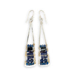 Lapis and onyx gemstones stacked with blue crystal on gold filled wire within a skinny, tall sterling silver triangle shaped earrings