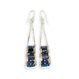 Lapis and onyx gemstones stacked with blue crystal on gold filled wire within a skinny, tall sterling silver triangle shaped earrings