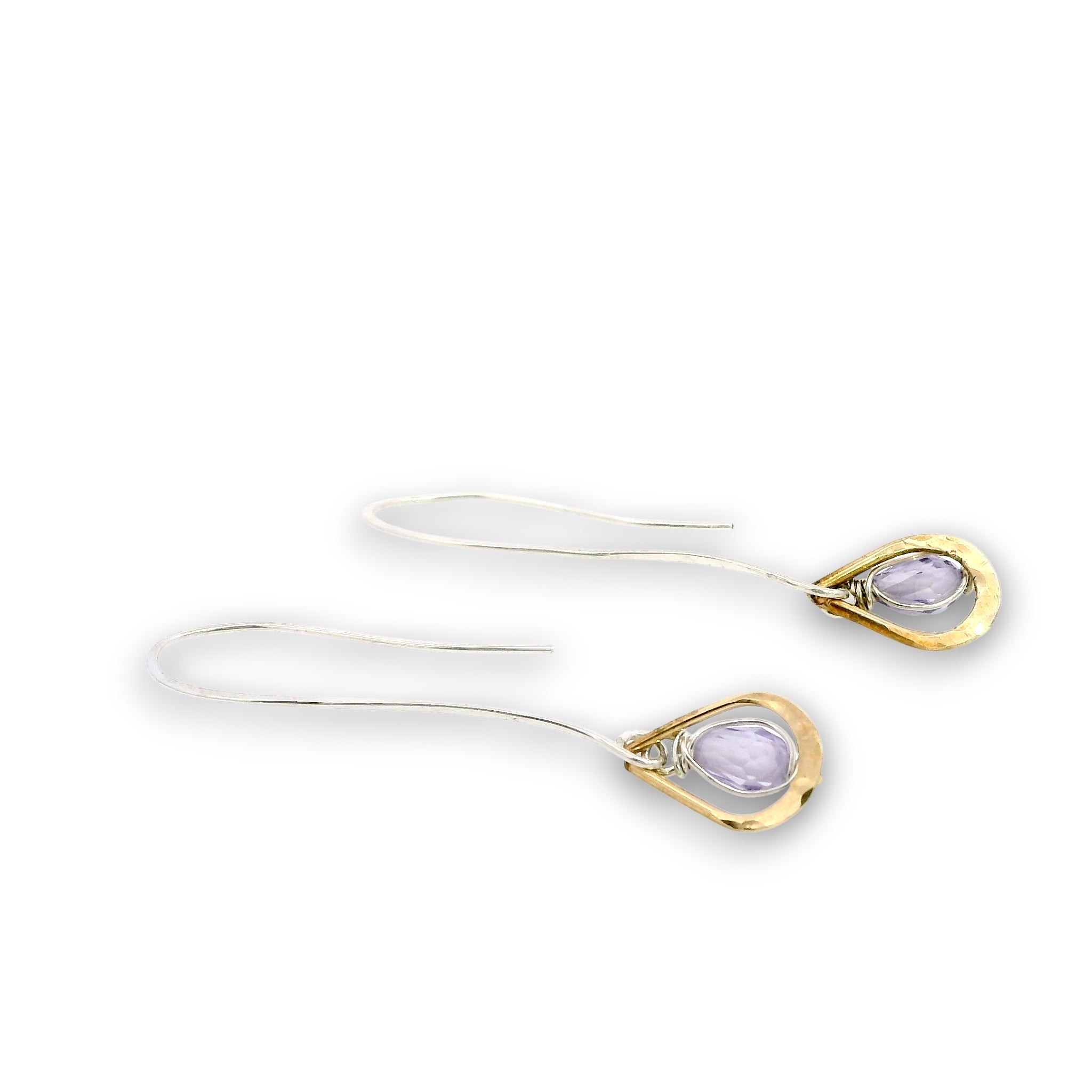 Lavender cubic zirconia drop gemstones sit inside tiny brass hammered teardrops on a long sterling silver earring hook