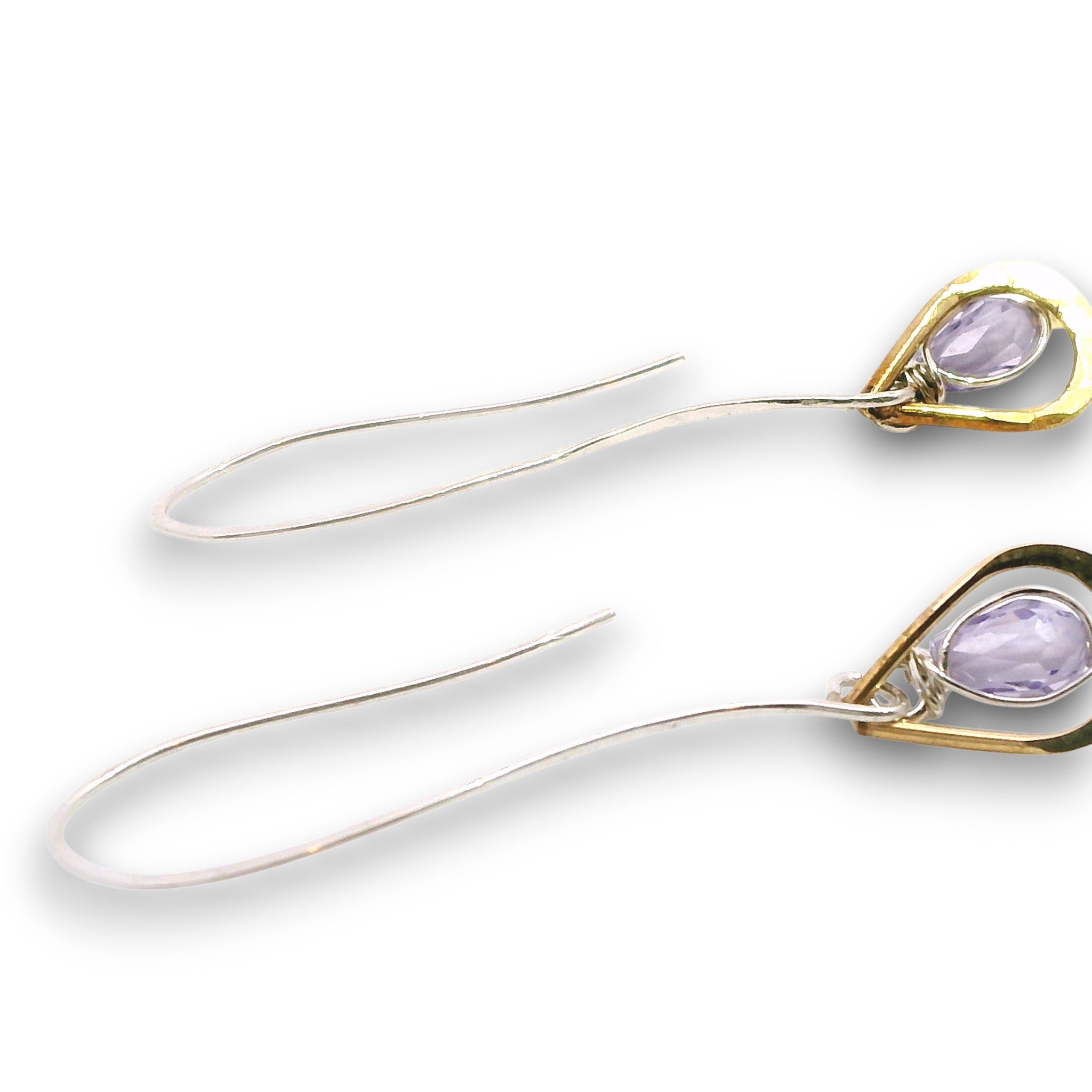 Lavender cubic zirconia drop gemstones sit inside tiny brass hammered teardrops on a long sterling silver earring hook