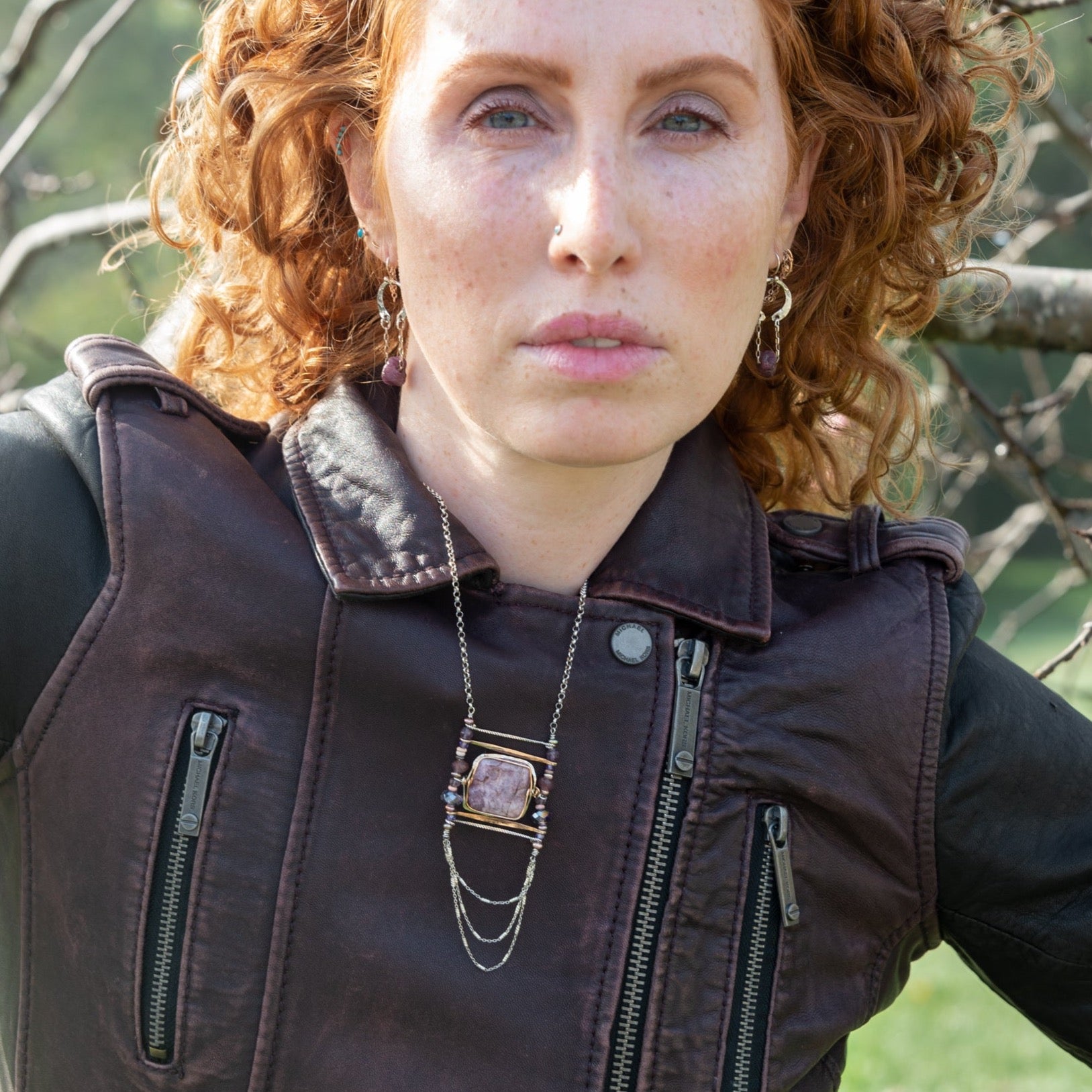 Lepidolite pendant necklace with sterling silver and bronze metals, accompanied by opal, amethyst and crystal gemstones. Dainty sterling silver sparkly chain