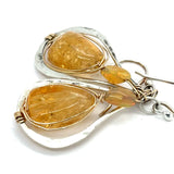 Smooth citrine nuggets are wrapped in gold filled wire inside a sterling silver handmade drop earring with opal accent