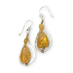 Smooth citrine nuggets are wrapped in gold filled wire inside a sterling silver handmade drop earring with opal accent