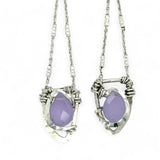 A pair of sterling silver earrings featuring faceted tear drop lavender jade stones with sterling silver chains and a cubic zirconia closure