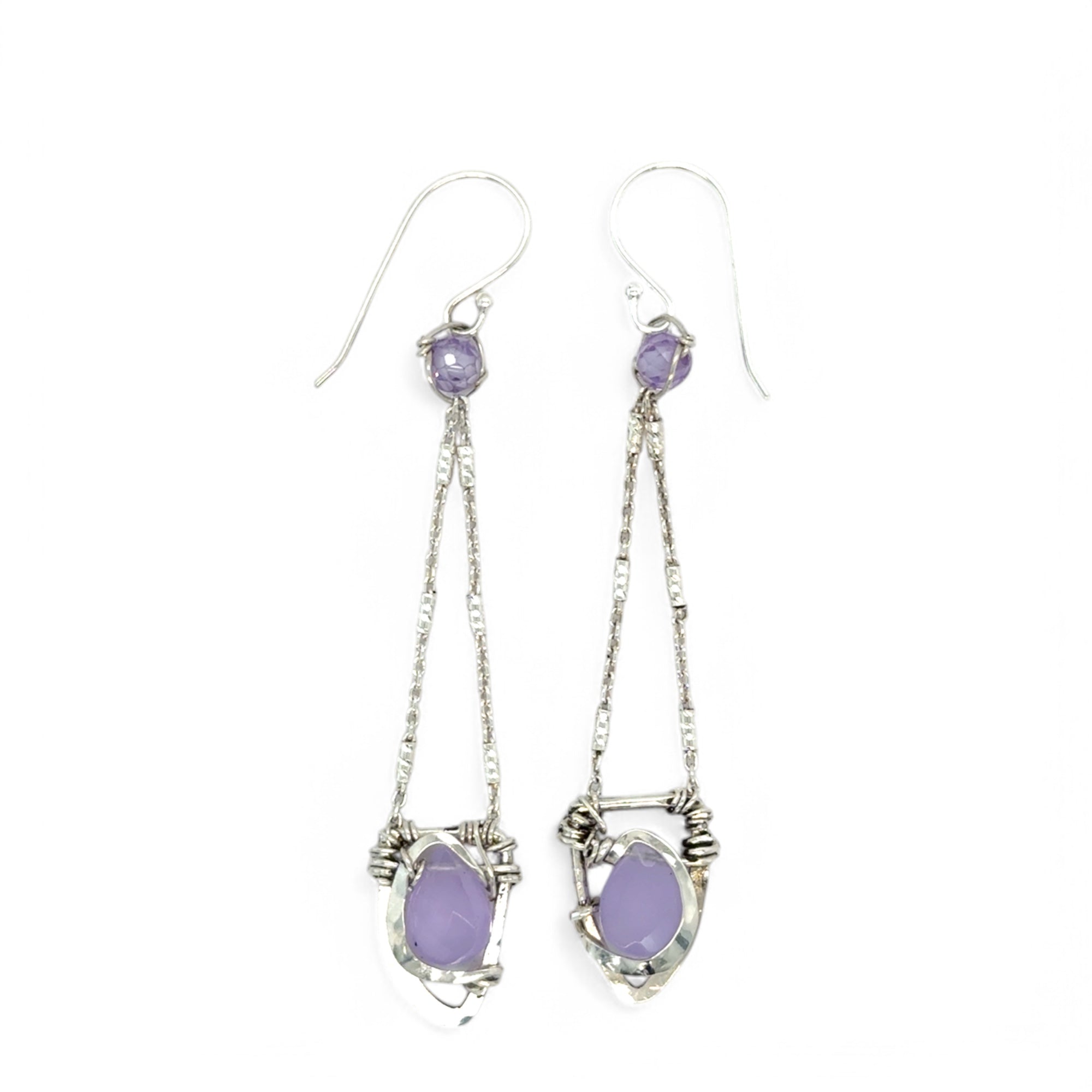 A pair of sterling silver earrings featuring faceted tear drop lavender jade stones with sterling silver chains and a cubic zirconia closure