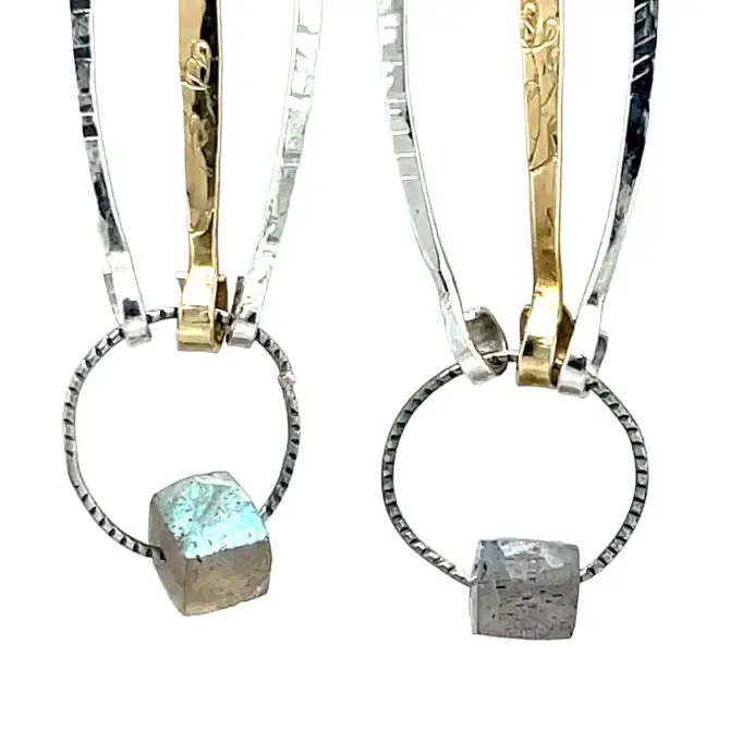 Stamped sterling silver and brass marquise earrings with a tiny, flashy labradorite cube hanging at the bottom