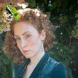 Stamped sterling silver and brass marquise earrings with a tiny, flashy labradorite cube hanging at the bottom