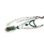 Turquoise rectangle wrapped in layers of hammered bronze and sterling silver wire pendant with another layer with chrysocolla and labradorite drop gemstones on oxidized sterling silver links and chain