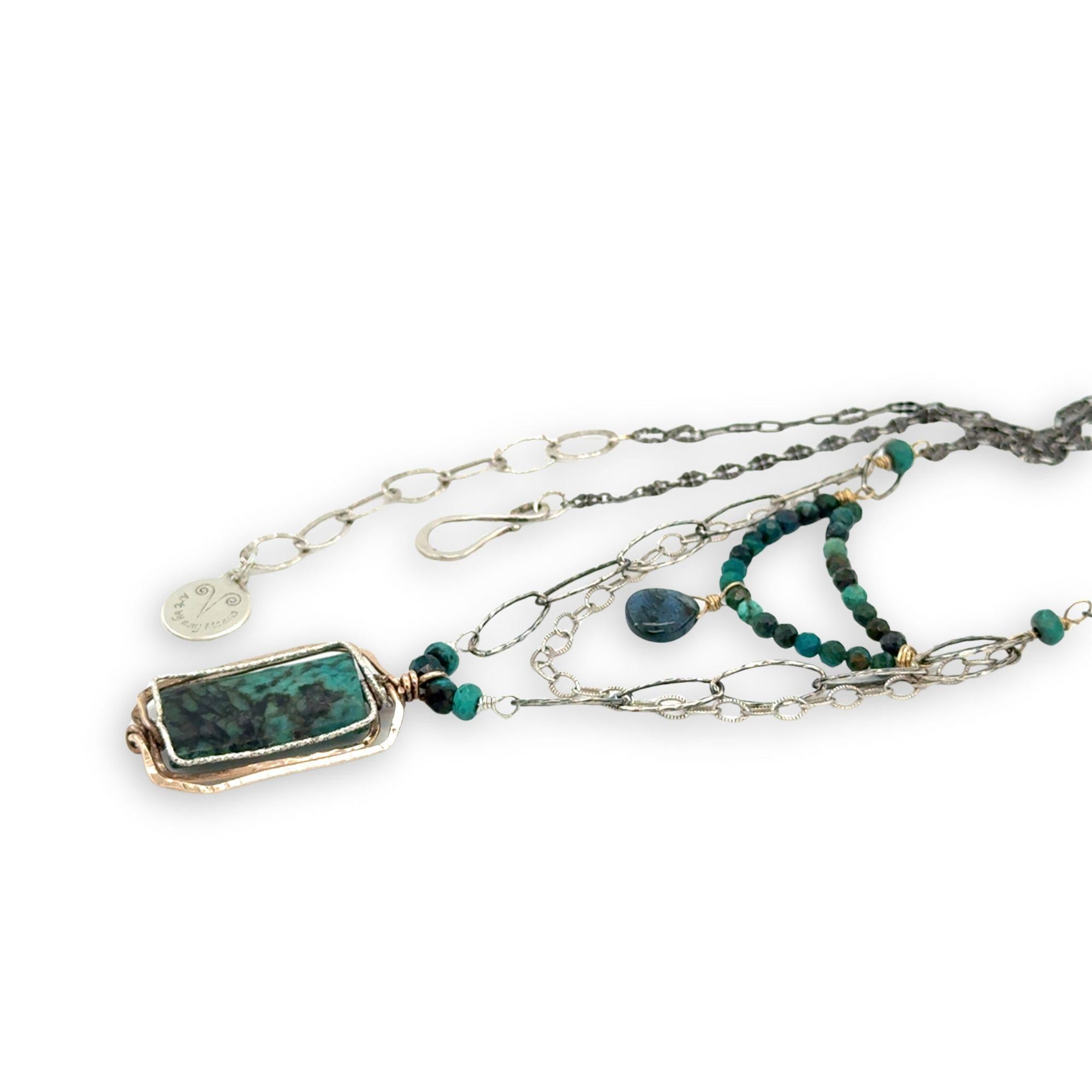 Turquoise rectangle wrapped in layers of hammered bronze and sterling silver wire pendant with another layer with chrysocolla and labradorite drop gemstones on oxidized sterling silver links and chain