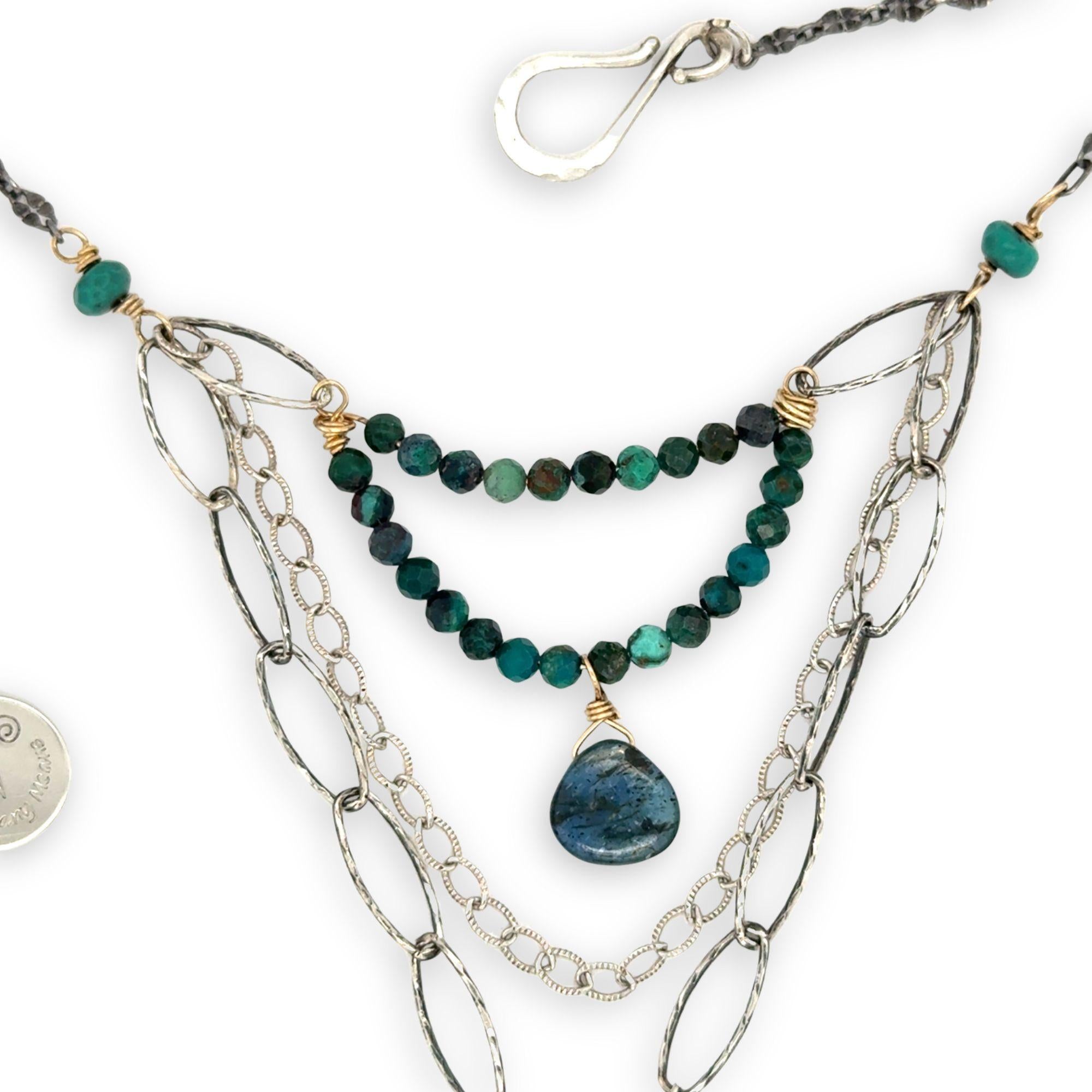 Turquoise rectangle wrapped in layers of hammered bronze and sterling silver wire pendant with another layer with chrysocolla and labradorite drop gemstones on oxidized sterling silver links and chain