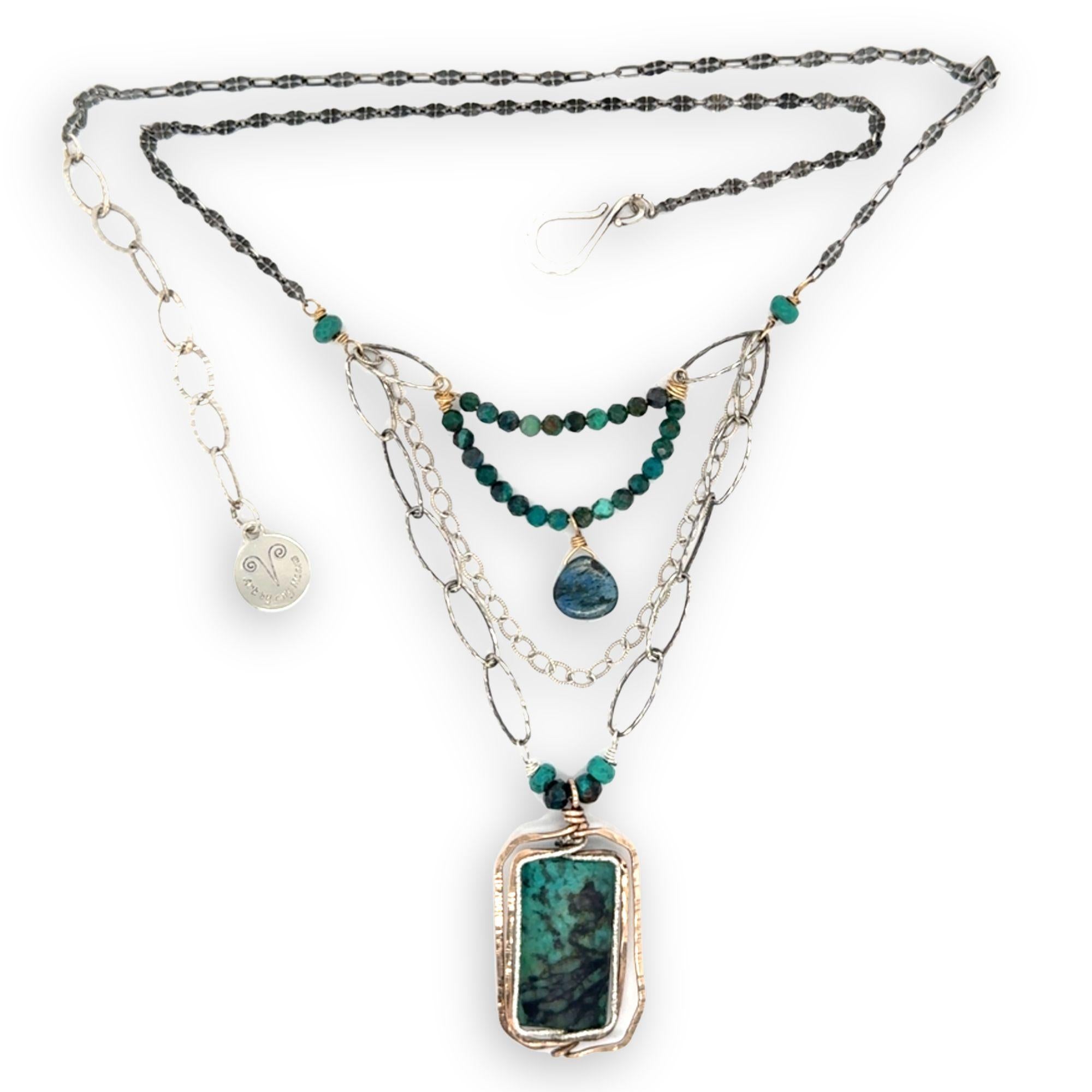 Turquoise rectangle wrapped in layers of hammered bronze and sterling silver wire pendant with another layer with chrysocolla and labradorite drop gemstones on oxidized sterling silver links and chain