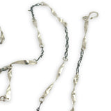 Handmade hammered an twisted sterling silver bars interspersed between oxidized sterling silver chain long necklace