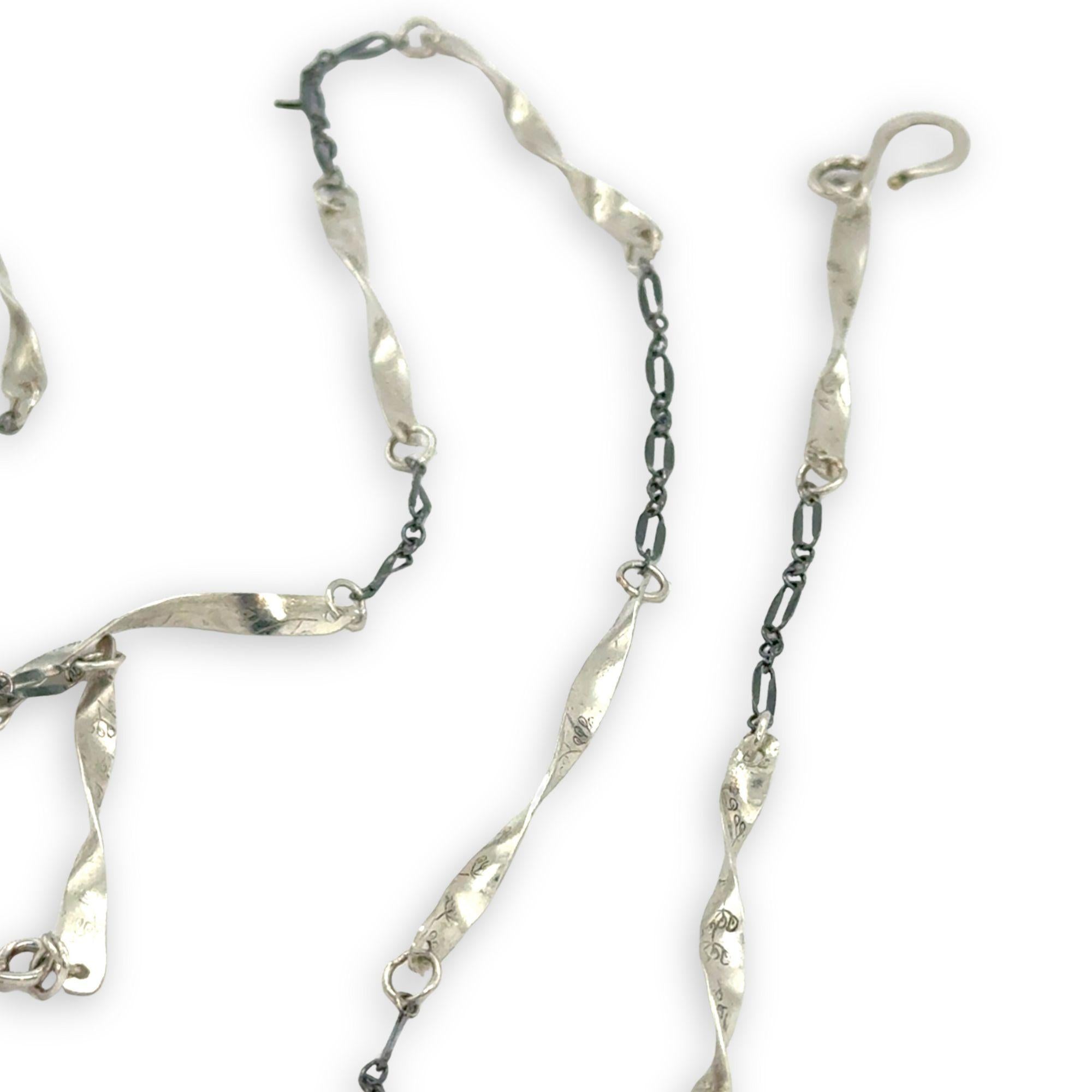 Handmade hammered an twisted sterling silver bars interspersed between oxidized sterling silver chain long necklace