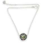 sterling silver hammered dot wire pendant with green fresh water pearl tile surrounded by ruby zoisite and pyrite gemstones necklace